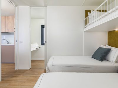 camping-arena-stupice-mobile-home-camping-home-first-row-to-the-sea-interior-bedroom-single-beds-2