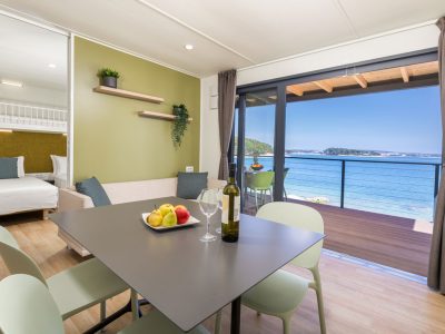 camping-arena-stupice-mobile-home-camping-home-first-row-to-the-sea-interior-dining-area-3