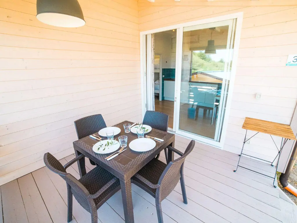 camping-village-resort-pax-4-exterior-dining-table-on-terrace