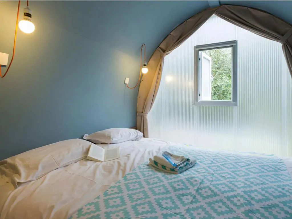 lago-idro-glamping-boutique-glamping-tent-coco-suite-interior-bedroom-double-bed