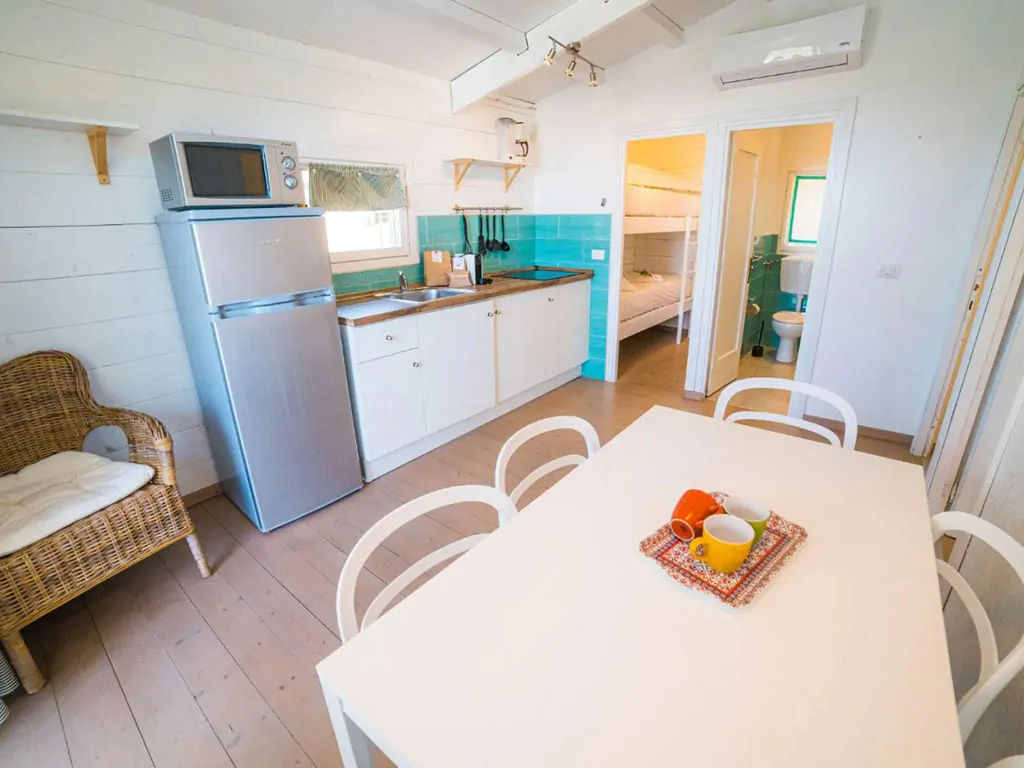 vallicella-glamping-resort-chalet-for-6-interior-kitchen-living-room