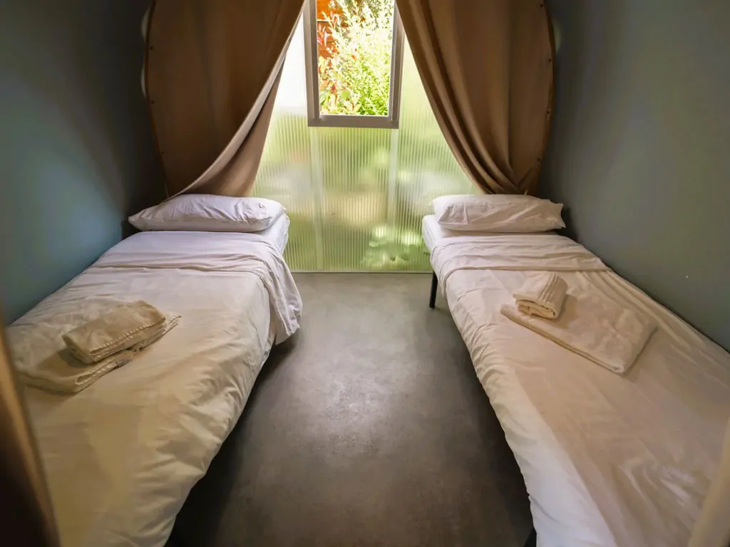 vallicella-glamping-resort-glamping-tent-coco-suite-interior-bedroom-single-beds