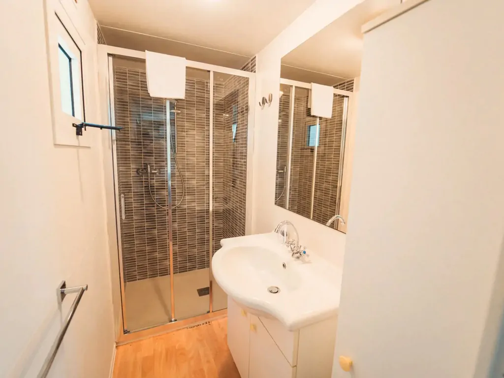 cottage-classic-bathroom-with-sink-and-shower