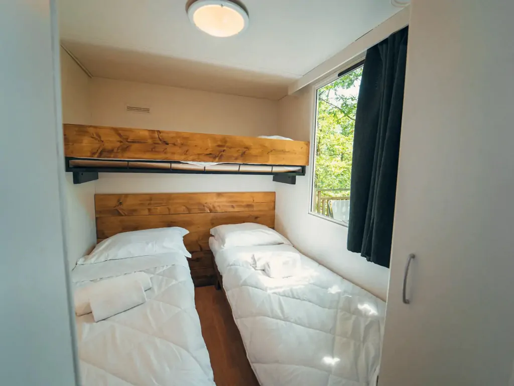 cottage-classic-bedroom-with-single-and-bunk-beds