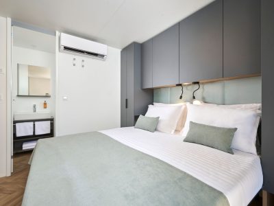 aminess-atea-camping-resort-luxury-glamping-villa-pool-view-interior-bedroom-double-bed-4