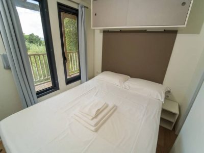 vallicella-glamping-resort-cottage-next-l-bedroom-with-double-bed