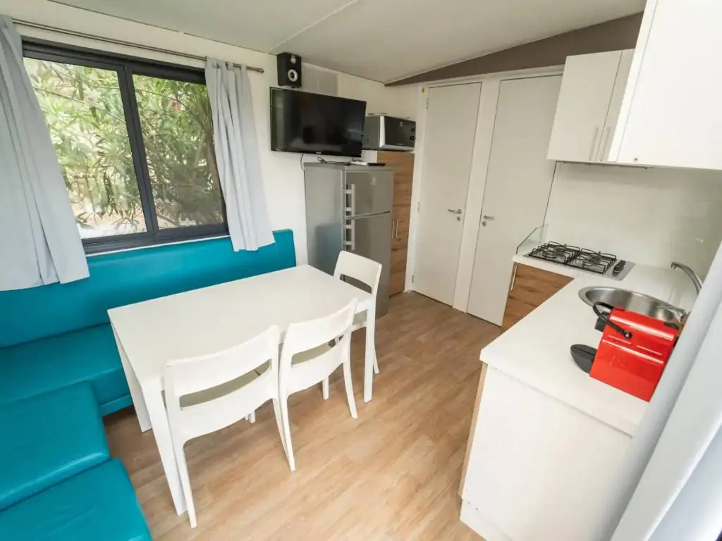 vallicella-glamping-resort-cottage-next-l-living-room-with-couch