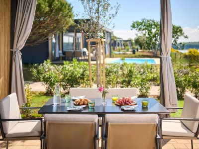 aminess-planet-camping-sirena-mobile-home-luxury-sea-view-with-private-pool-exterior-terrace-table