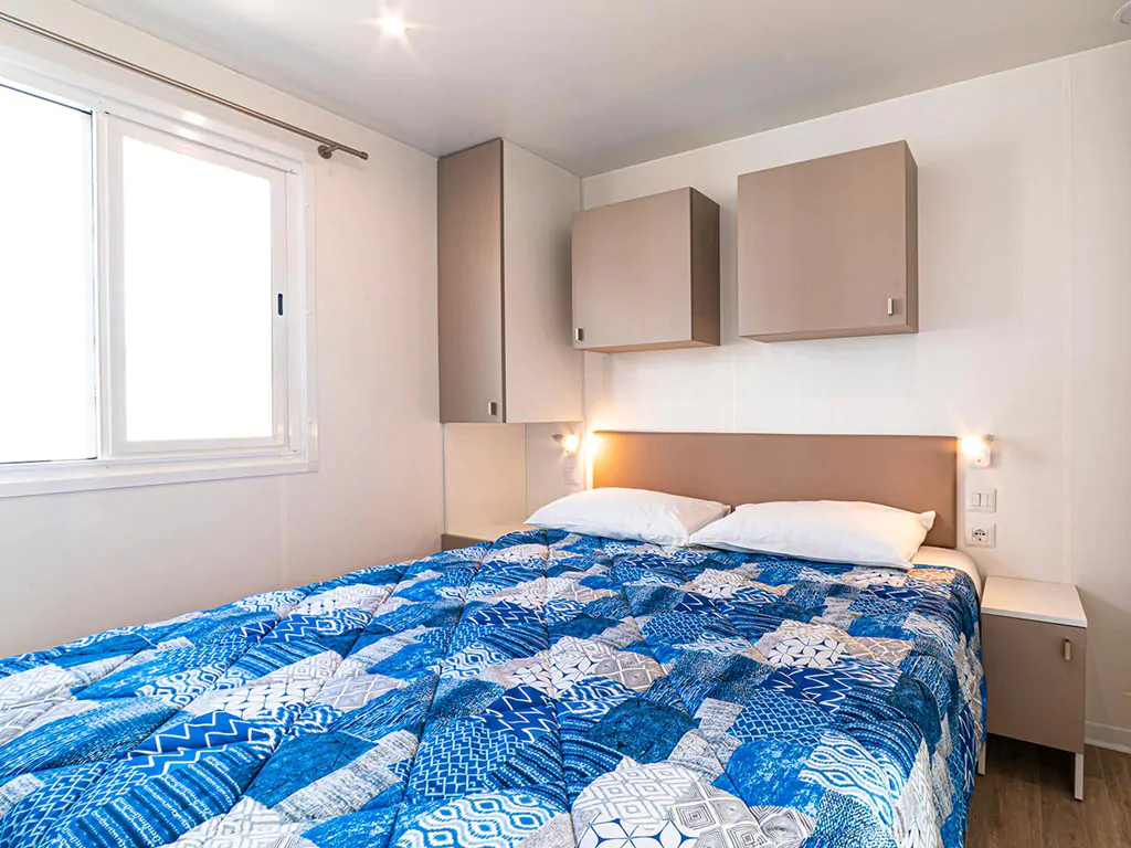 baia-holiday-isuledda-mobile-home-baia-revolution-interior-bedroom-double-bed