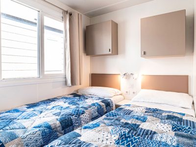 baia-holiday-isuledda-mobile-home-baia-revolution-interior-bedroom-single-bed
