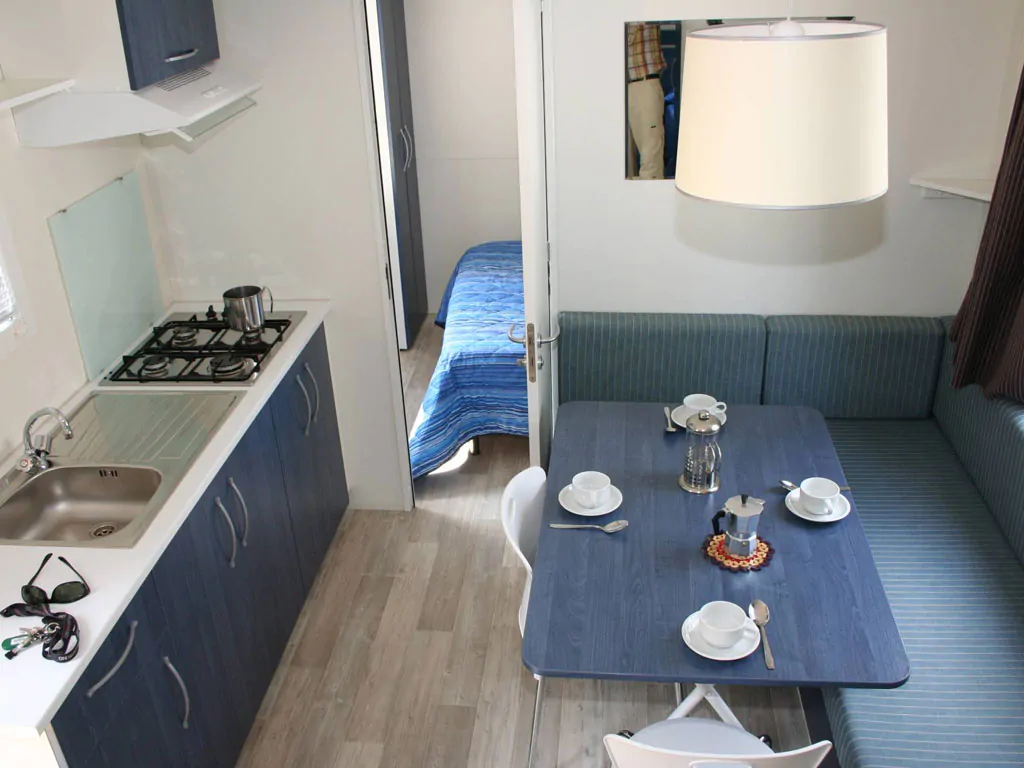 camping-costa-d-argento-mobile-home-happy-easy-interior-kitchen-dining-table