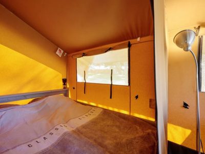 camping-village-cisano-san-vito-glamping-tent-estivo-safari-tent-compact-interior-bedroom-double-bed-2