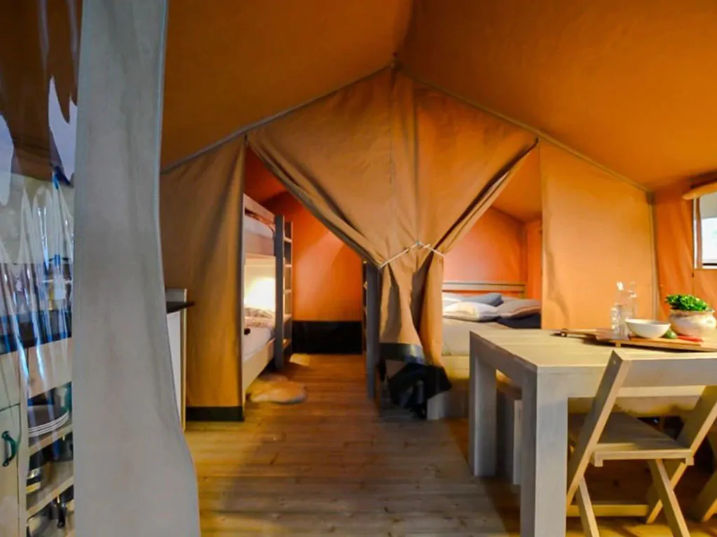 camping-village-cisano-san-vito-glamping-tent-estivo-safari-tent-compact-interior-bedroom-view-2