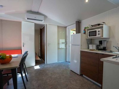 mobile-home-happy-premium-suite-interior-kitchen-and-dining-area