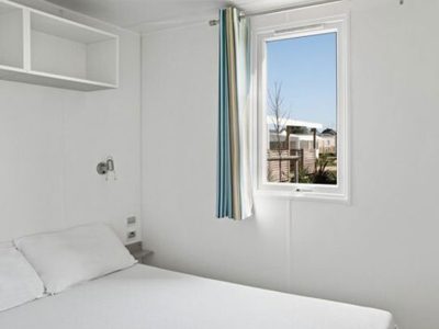 hu-i-pini-village-mobile-home-classic-interior-bedroom-double-bed