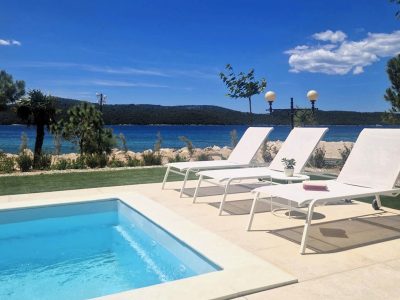 amadria-park-sibenik-mobile-home-exterior-pool-sun-beds-sea