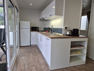 camping-bella-italia-moible-home-bella-family-exterior-kitchen-view-and-terrace