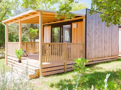 camping-naturist-solaris-casa-pini-mobile-home-couple-exterior-mobile-home