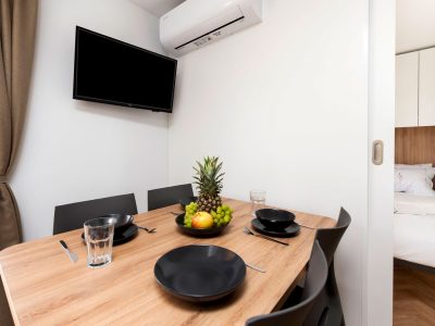 camping-naturist-solaris-casa-pini-mobile-home-luxury-interior-dining-area