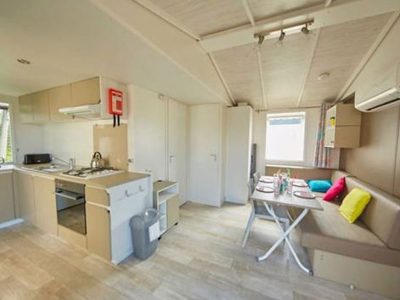 hu-girasole-village-mobile-home-comfort-for-4-persons-interior-kitchen-and-living-room