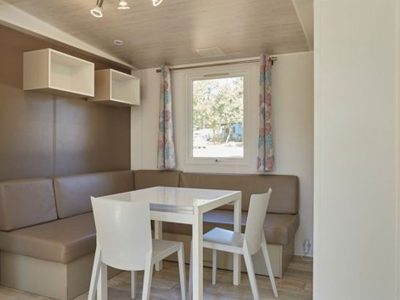 hu-girasole-village-mobile-home-comfort-for-6-persons-interior-dining-area-view