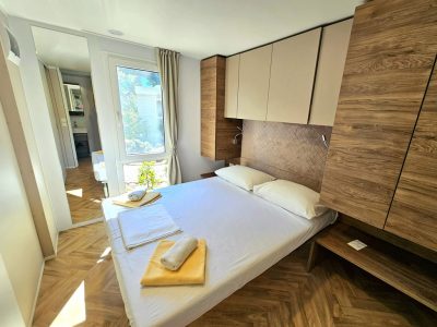 campsite-amadria-park-trogir-mobile-home-family-deluxe-interior-bedroom-double-bed