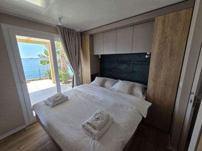 campsite-lavanda-mobile-home-sunset-pool-interior-bedroom-double-bed