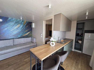 campsite-lavanda-mobile-home-sunset-pool-interior-kitchen-and-living-room