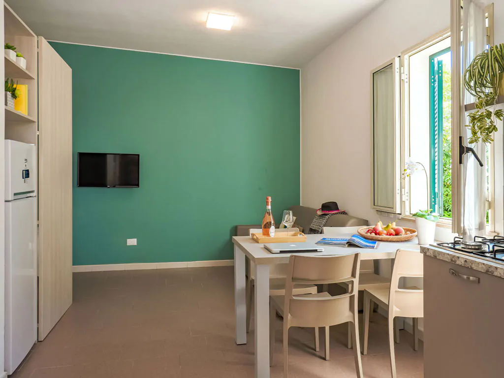 stork-family-collection-bungalow-bilocale-dog-interior-kitchen-and-dining-room