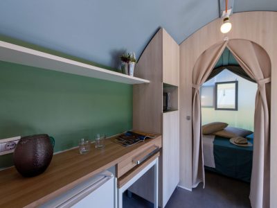 camping-village-punta-navaccia-glamping-tent-coco-tents-interior-kitchen-and-bedroom-view