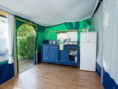 camping-village-punta-navaccia-glamping-tent-equipped-tents-interior-kitchen-view