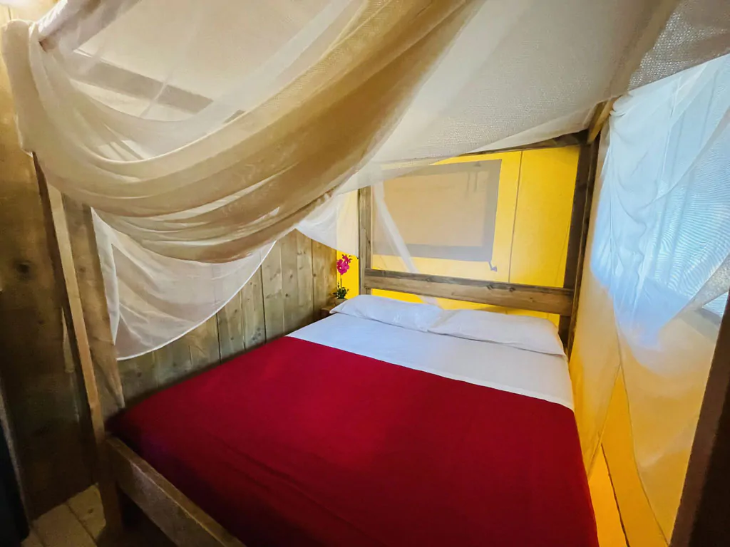 camping-village-punta-navaccia-glamping-tent-safari-lodge-tents-interior-bedroom-double-bed