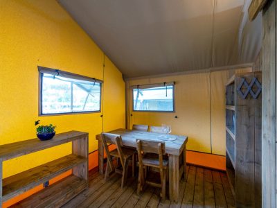 camping-village-punta-navaccia-glamping-tent-safari-lodge-tents-interior-dining-area