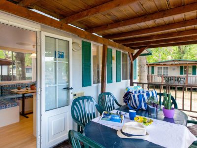camping-village-punta-navaccia-mobile-home-superior-exterior-terrace-table-view