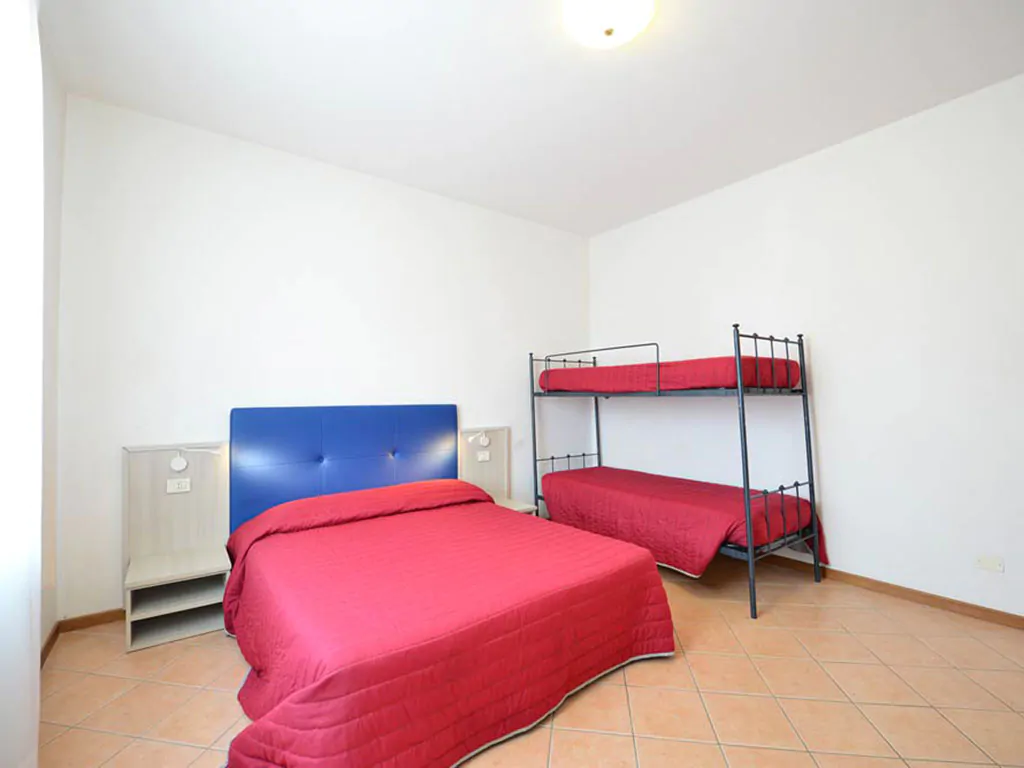 campsite-bella-italia-apartment-glicine-interier-bedroom