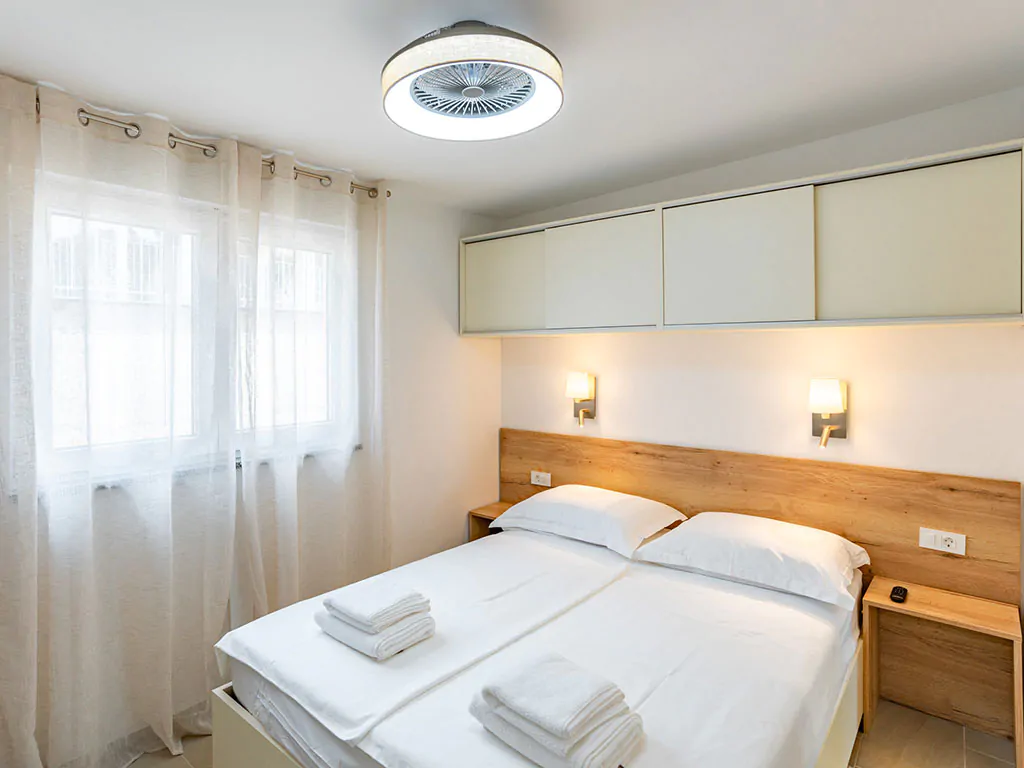 camping-arti-homes-rab-mobile-home-arti-studio-four-interior-bedroom-double-bed