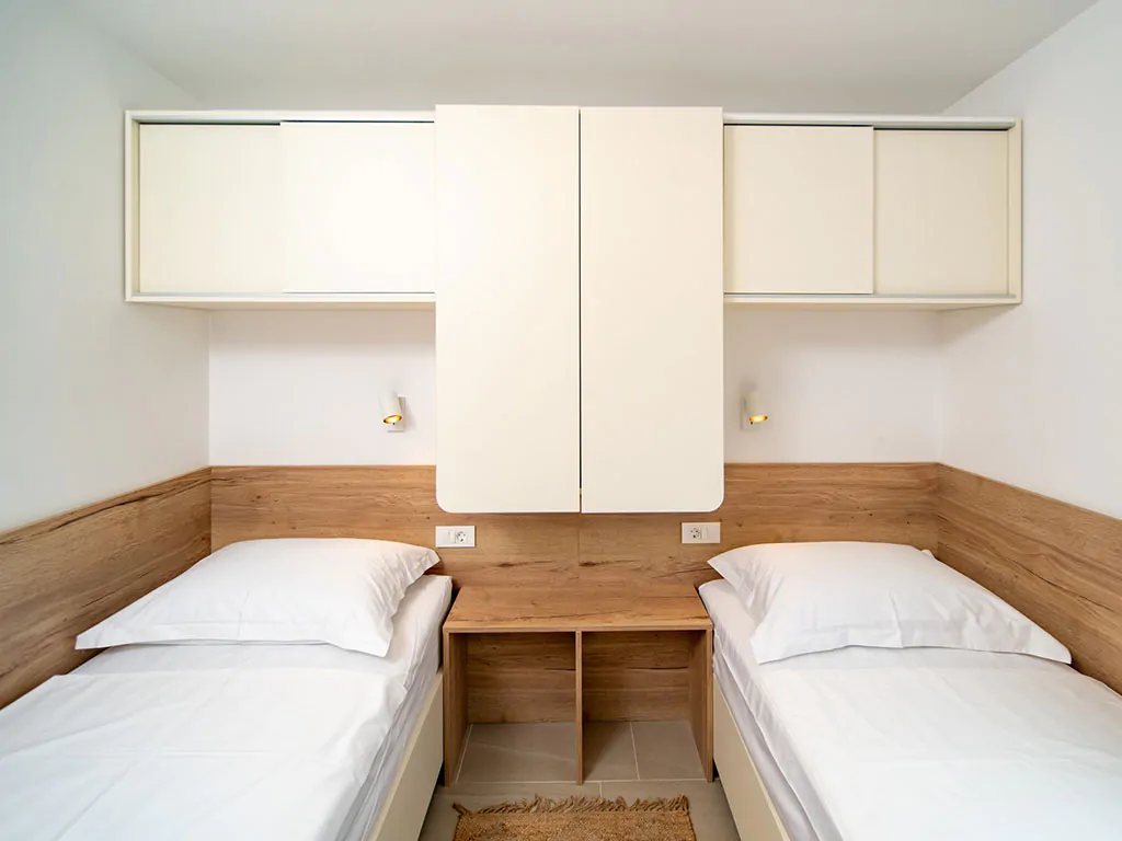 camping-arti-homes-rab-mobile-home-arti-studio-four-interior-bedroom-single-beds