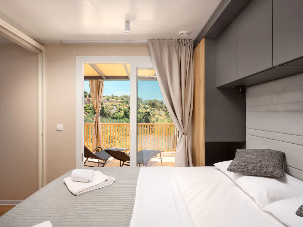 campsite-adriatic-cliff-two-bedroom-seaside-interior-bedroom-double-bed-view
