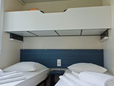 campsite-kovacine-mobile-home-family-interior-bedroom-single-beds
