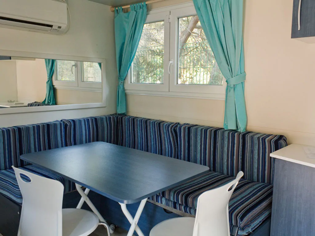 campsite-kovacine-mobile-home-family-interior-dining-area