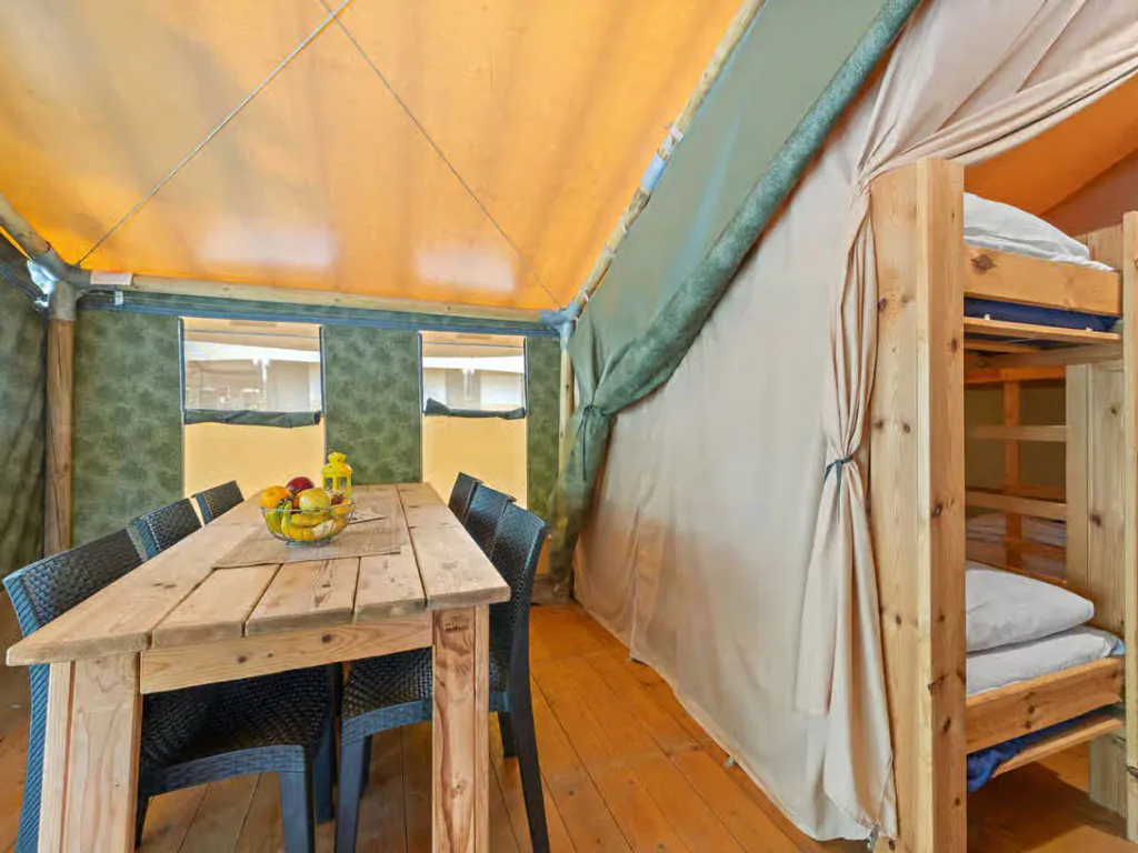campsite-polari-glamping-tent-safari-tent-relax-interior-dining-area-and-bedroom