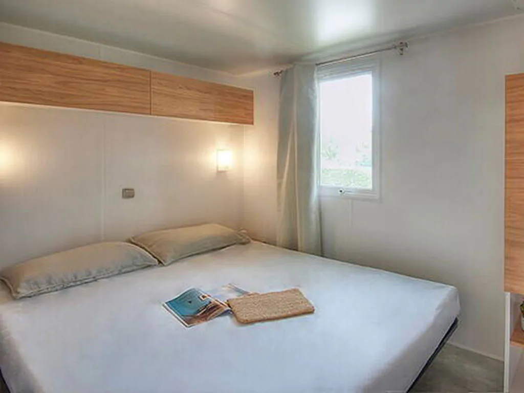 camping-brioni-mobile-home-classic-for-four-persons-interior-bedroom-double-bed
