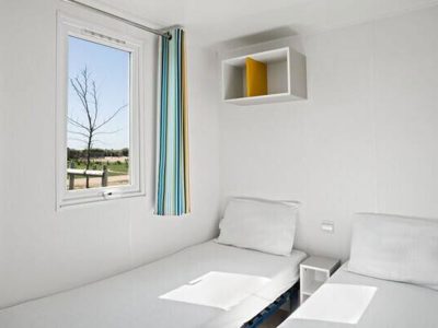camping-brioni-mobile-home-classic-for-four-persons-interior-bedroom-single-beds