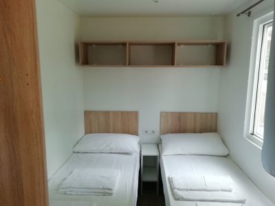 hu-firenze-certosa-camping-in-town-mobile-home-hu-stay-smart-interior-bedroom-singlebeds
