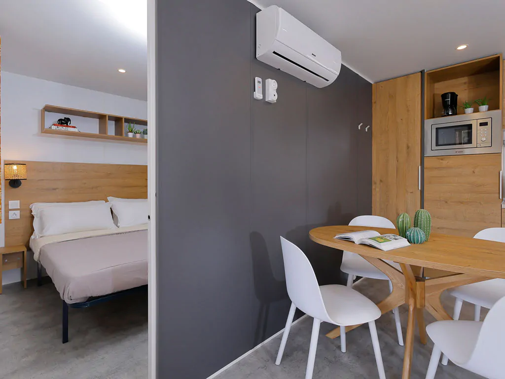 hu-roma-camping-in-town-mobile-home-hu-stay-premium-interior-livingroom-bedroom