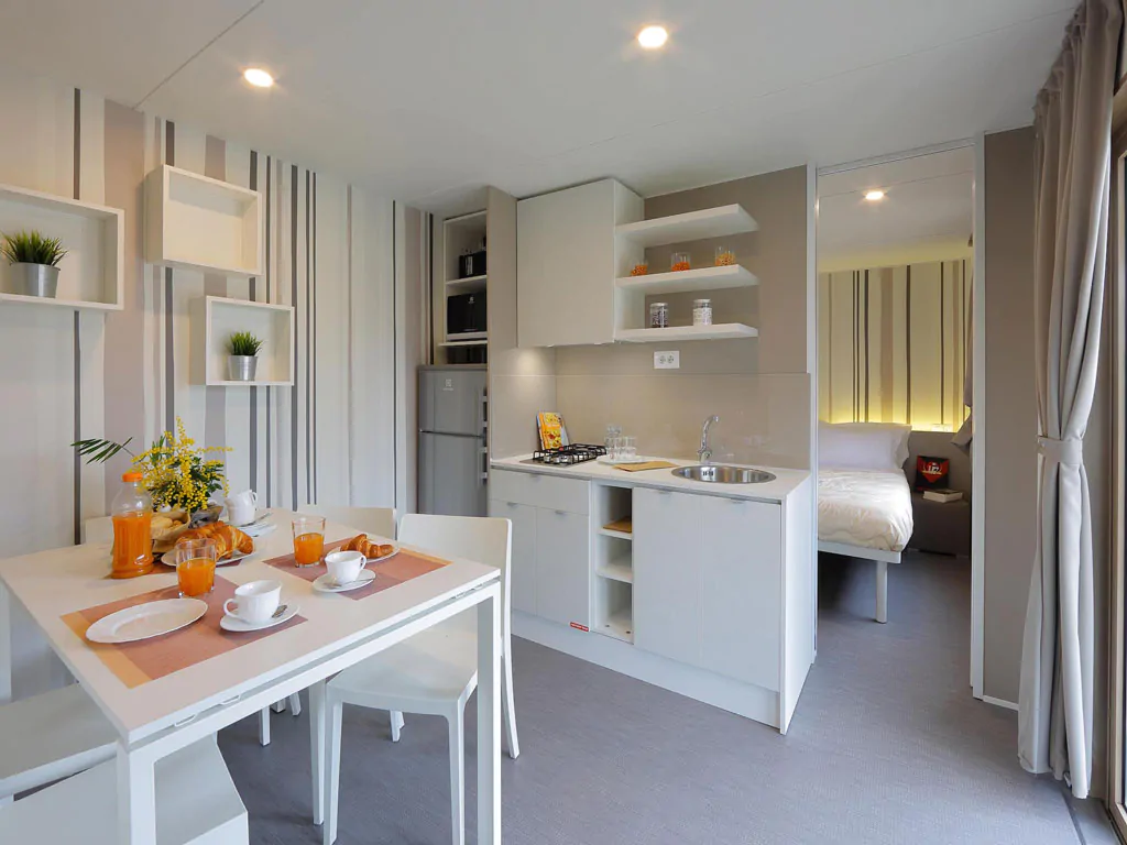 hu-roma-camping-in-town-mobile-home-hu-stay-premium-interior-livingroom-kitchen