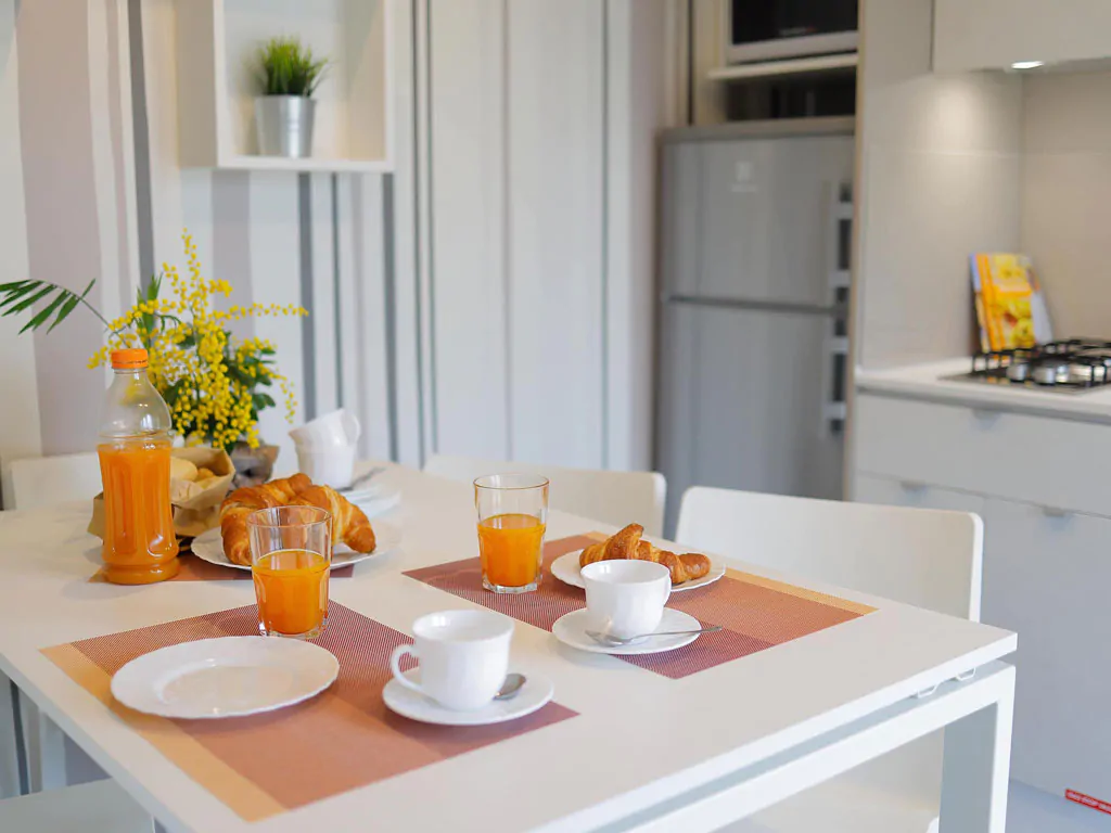 hu-roma-camping-in-town-mobile-home-hu-stay-premium-interior-livingroom-table