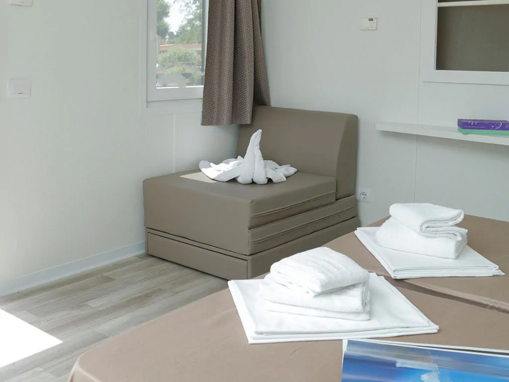 hu-roma-camping-in-town-mobile-home-hu-stay-smart-xs-plus-interior-sofa