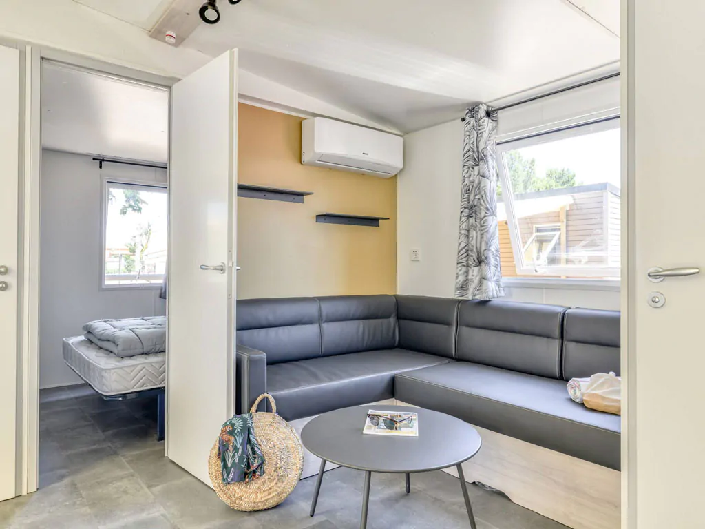 camping-bivillage-mobilehome-premium-for-four-interior-livingroom-sofa